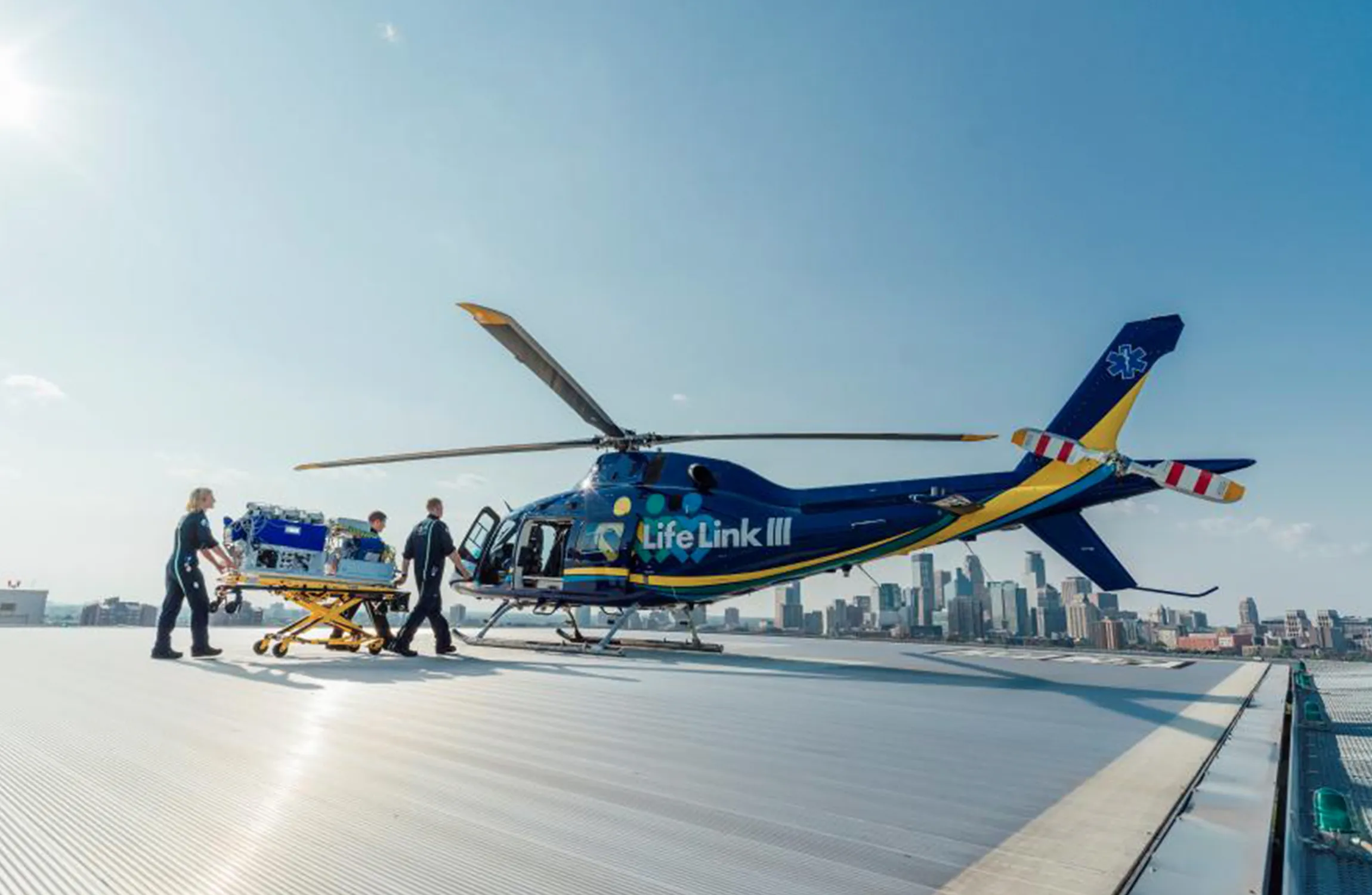 A cargo helicopter parked on top of a building