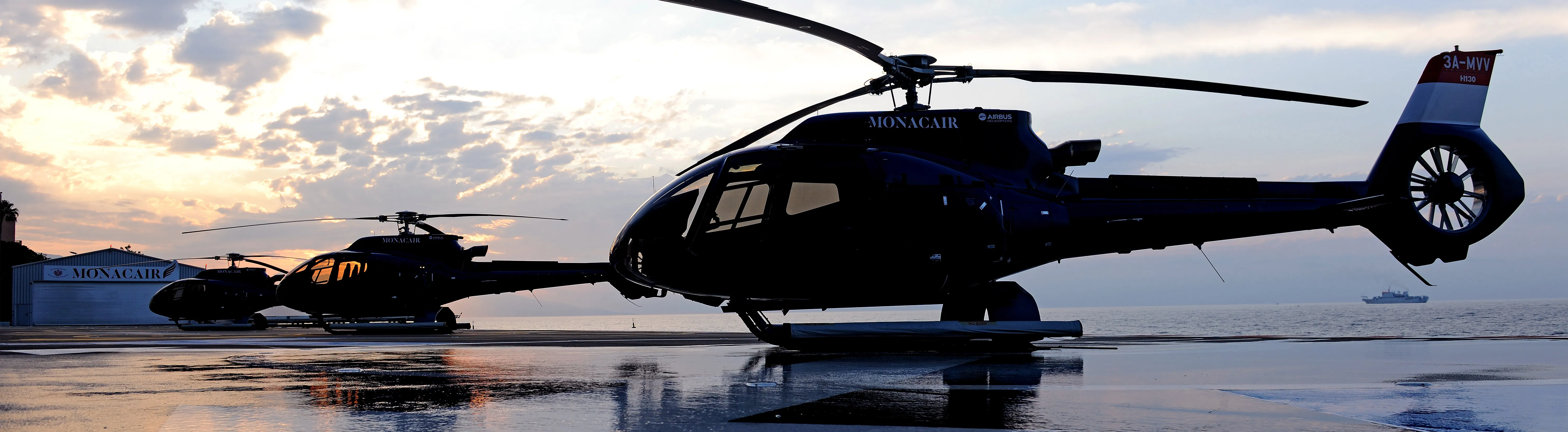 A string of parked helicopters